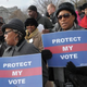 Activists held pro-voting-rights placards outside the Supreme Court on Feb. 27, 2013, in Washington, D.C., as the court prepared to hear Shelby County v. Holder.
MANDEL NGAN/AFP/Getty Images